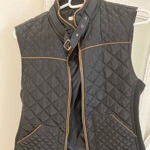 Black vest with brown lining